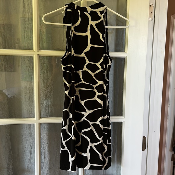 Adorable SHORT giraffe print dress. Worn once. - Picture 2 of 2